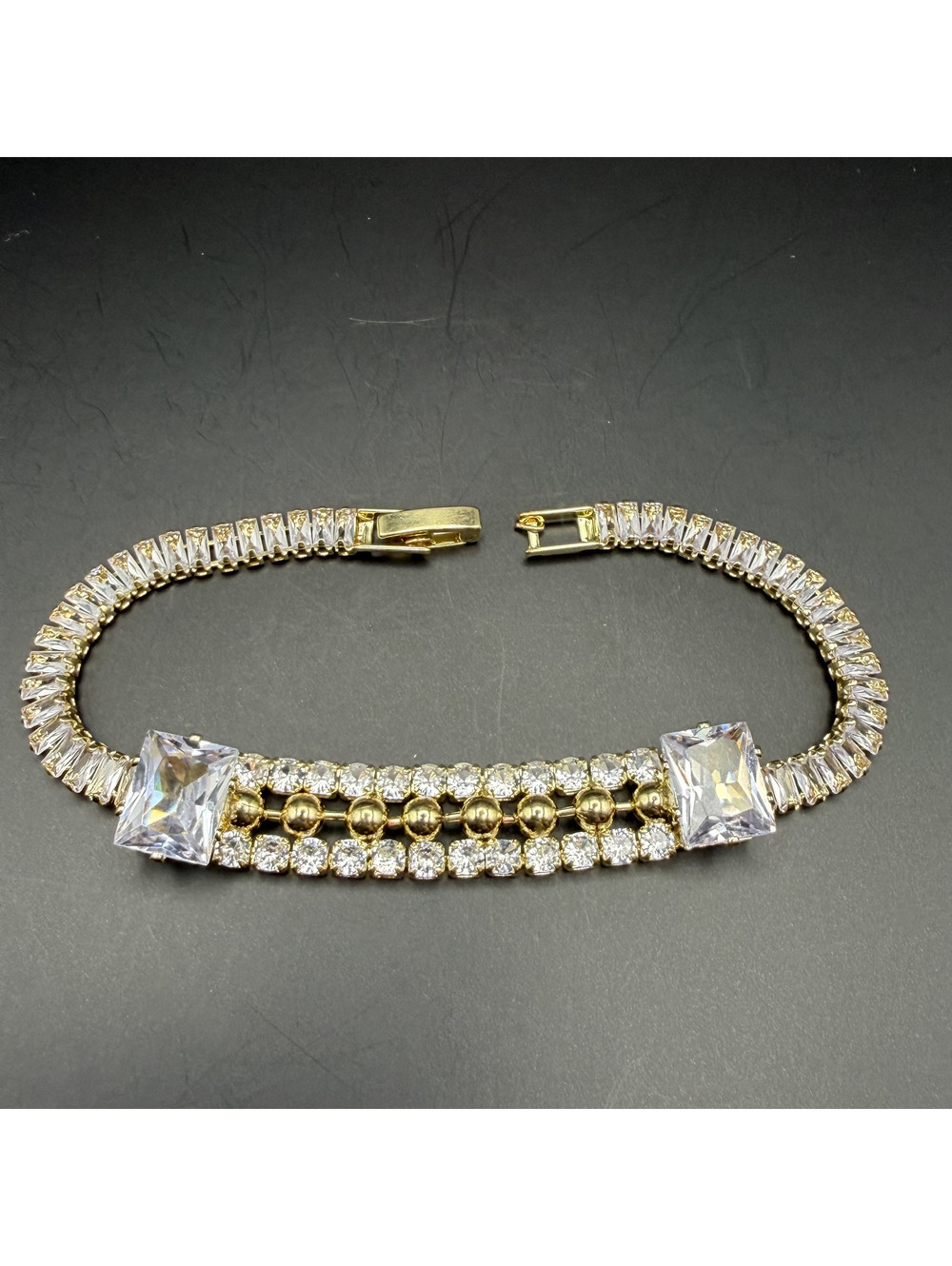 candy+clover clear baguette crystal gold tone statement bracelet